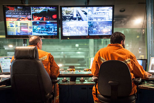 2 Men in AltaSteel Control Room